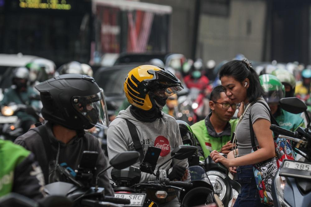 Prabowo Resmi Teken Perpres Ojol, Potongan Aplikator Jadi 8 Persen 24 image 4 Cermin Kita Cermin Dunia